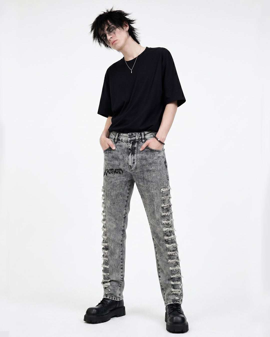 Men's distressed grey skinny denim jeans with ripped detailing and acid wash finish