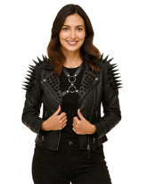 Woman wearing Killstar Black Magic black vegan leather biker jacket with spiked shoulders and silver hardware