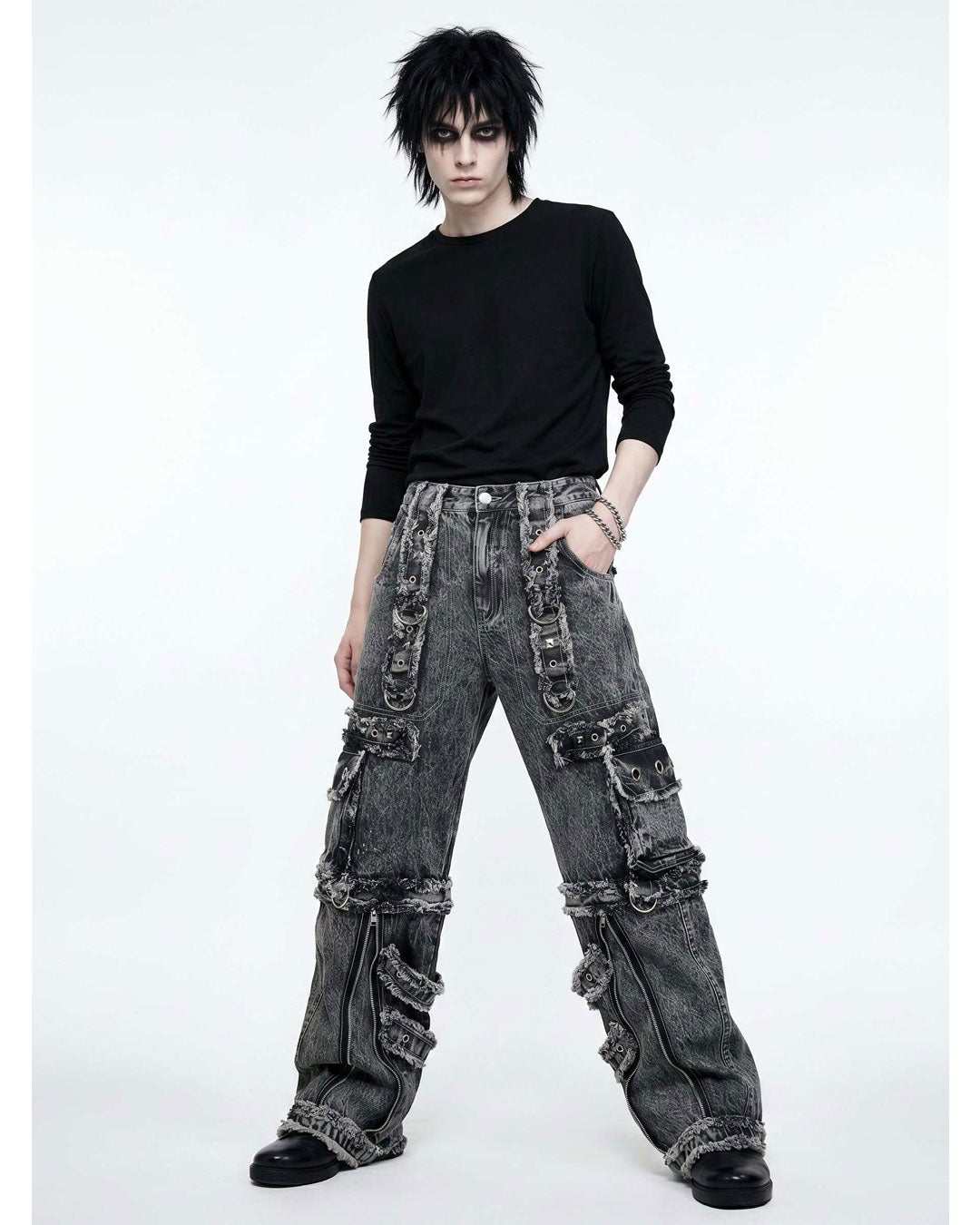 Distressed black denim cargo pants with oversized fit and multiple pockets in Y2K streetwear style