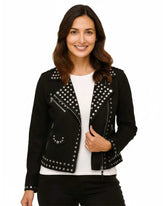 woman wearing black studded suede leather biker jacket with asymmetrical zipper and metal studs