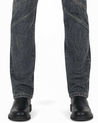 Front view of Twilight Veil Denim Pant in dark wash with detailed stitching and black boots