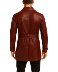 Back view of a man wearing a maroon leather trench coat with a belted waist and detailed stitching