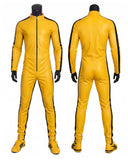 A bright yellow full-body latex or leather-like jumpsuit shown from the front and back on black mannequins, with black side stripes and black gloves, against a plain white background.