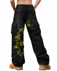 Black TRIPPPRS Death-Core cargo pants with red skull-grenade graphic and spider logo
