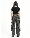 Back view of Baggy Cargo Jeans Women in washed black denim showing the relaxed wide leg cargo jeans design.