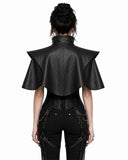 A model shown from the back wearing a black faux-leather gothic cape top with dramatic shoulder flaps, paired with black pants and a corset-style waist piece, against a plain white background.