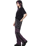 Side view of grunge denim cargo pants showing lace-up panel and wide-leg fit