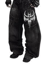 Unisex Gothic Skull jeans in vintage washed black denim with large white embroidered skull and relaxed wide-leg fit
