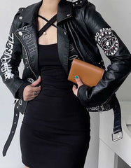 Women’s black graphic faux leather biker jacket with white and red prints, asymmetrical zipper, and belted waist.