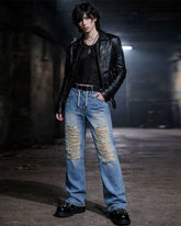 Distressed denim jeans with spider gothic graphic and wide-leg streetwear fit by TRIPPPRS