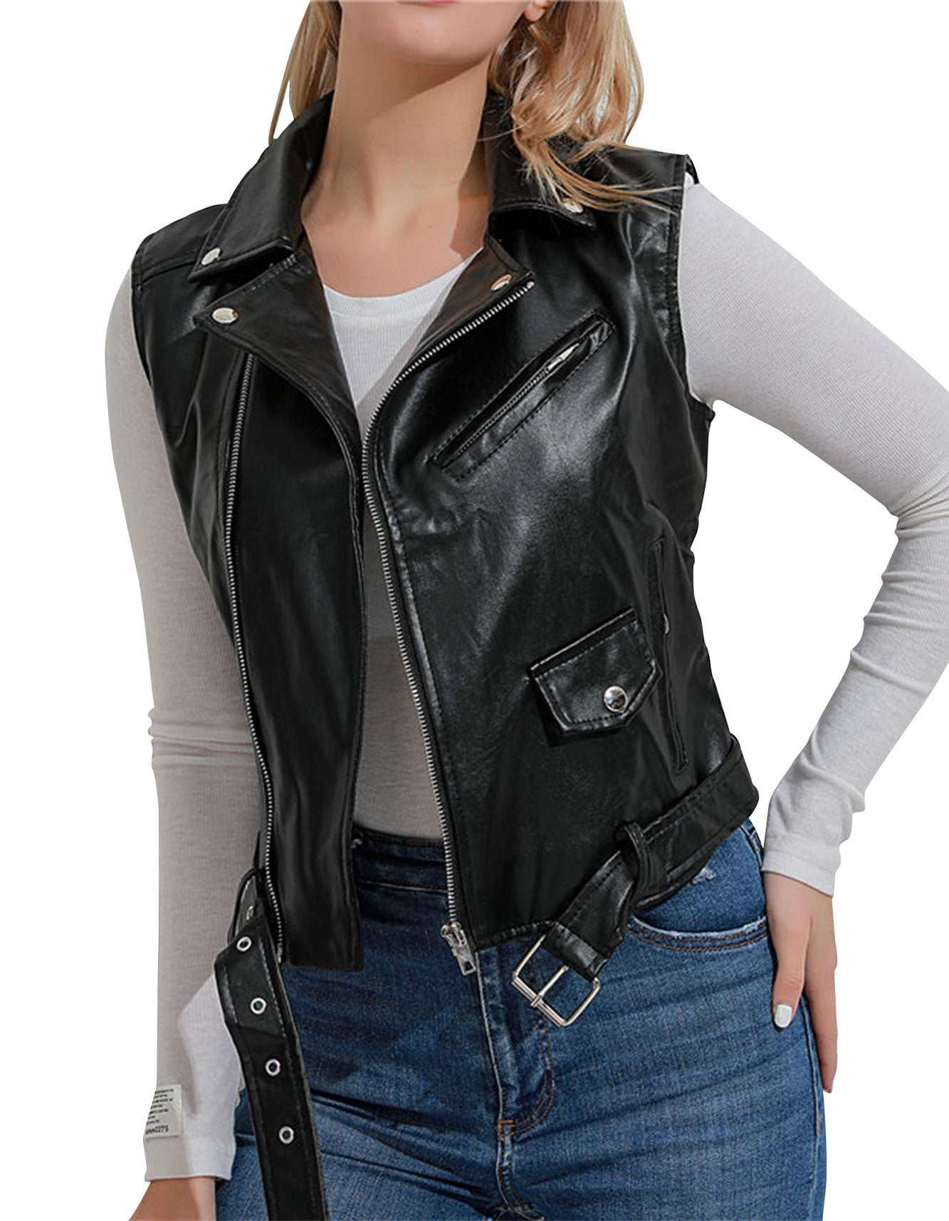 Women's black moto leather vest with zipper and adjustable straps, styled over long sleeve shirt and jeans