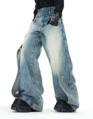 Layered Distressed Blue Jeans with wide-leg fit and ripped details in bold streetwear style
