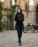 Women's velvet Gothic tailcoat with intricate buttons and sweeping tails, showcasing Victorian elegance and dark romantic style