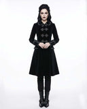 Women wearing elegant black velvet gothic coat with Victorian design and ornate buttons