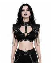 Women wearing a black gothic leather shoulder harness with buckle collar, studded straps, O-rings and silver chains, front view