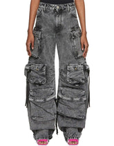 Phantom Rogue Cargo Jeans in distressed denim with oversized fit, multiple utility pockets, and gothic strap details.