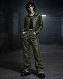 Model wearing 2026 green leather suite with wide-leg trousers and cropped jacket in gothic streetwear style