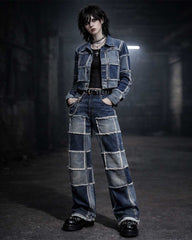 Unisex patch work denim suite featuring a cropped jacket and wide-leg pants with raw-edge stitching and contrast panels in gothic streetwear style.