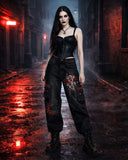 Denim cargo pants for women in black with utility pockets and bold red gothic graphic artwork shown in lifestyle front view and back view.