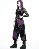 Person wearing a gothic-style outfit with purple and black colors on a white background