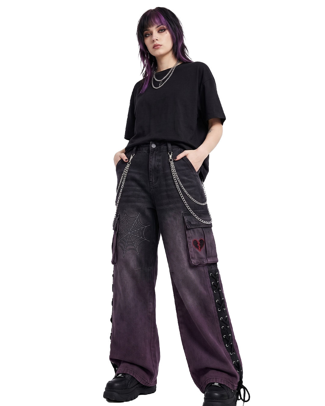 Woman wearing wide leg cargo pants in ombre grunge denim wash, front view