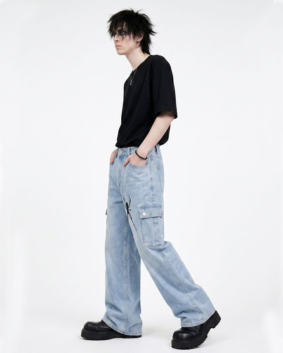Men's oversized light blue baggy jeans with utility pockets, full front view