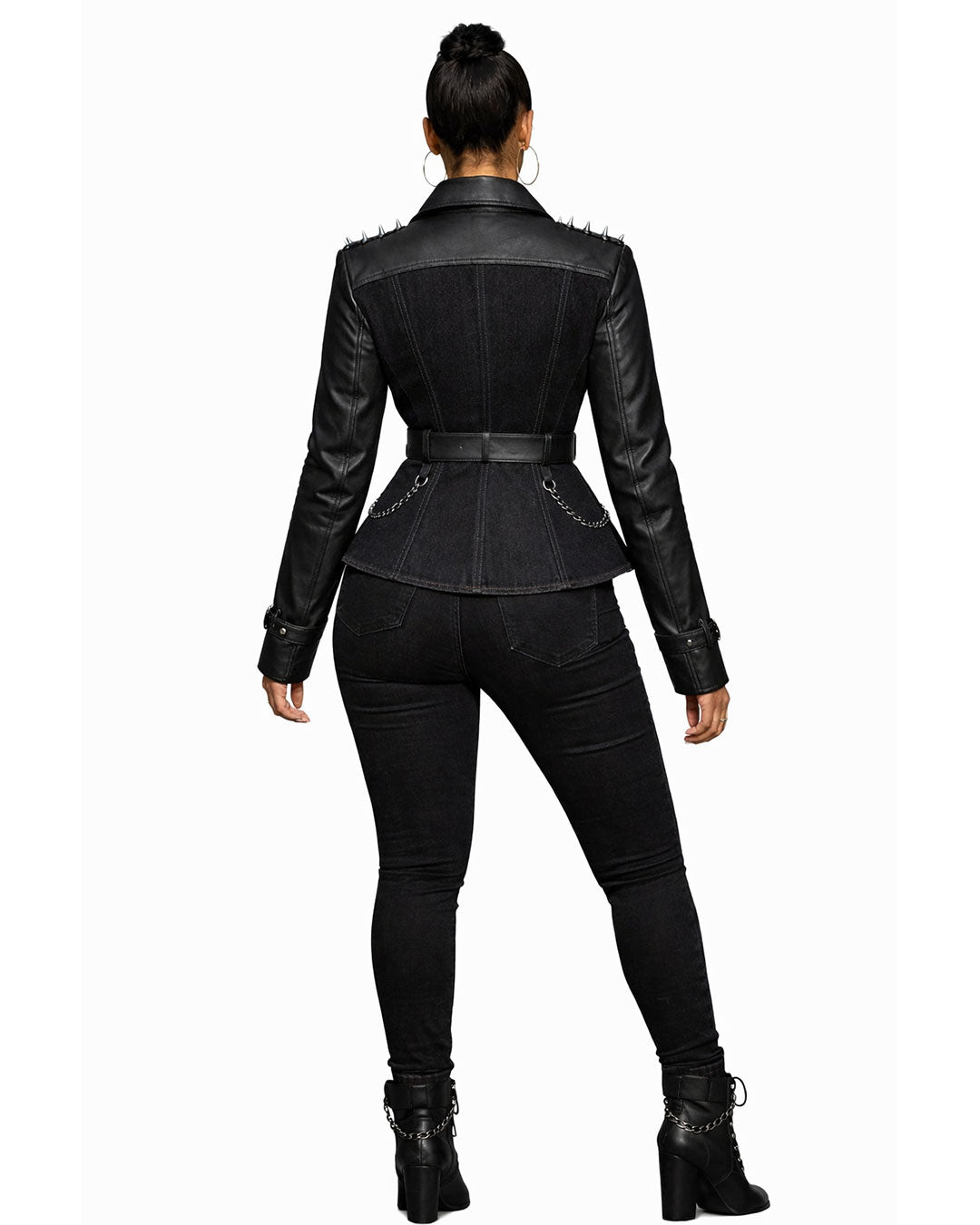Women's black leather punk jacket styled in an edgy alternative outfit