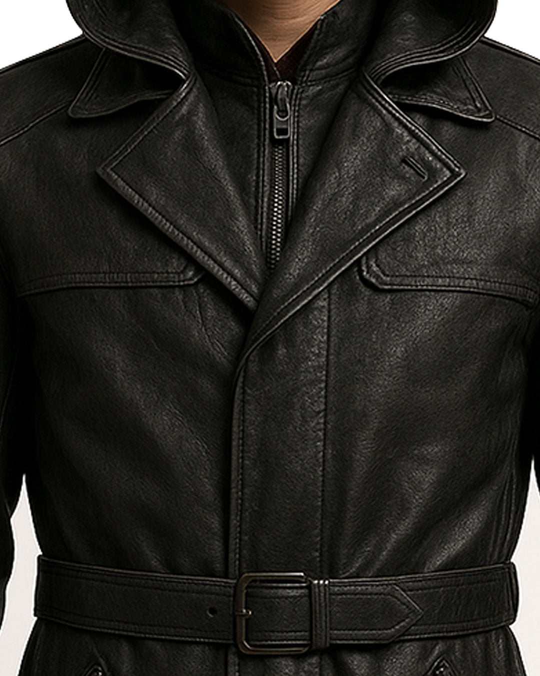 close-up of black genuine leather trench coat with double-breasted front and adjustable belt in streetwear gothic fashion style