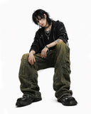 Mens baggy cargo jeans in washed dark denim with wide-leg fit, utility straps, curved seam panels, and streetwear styling shown in product and model view.