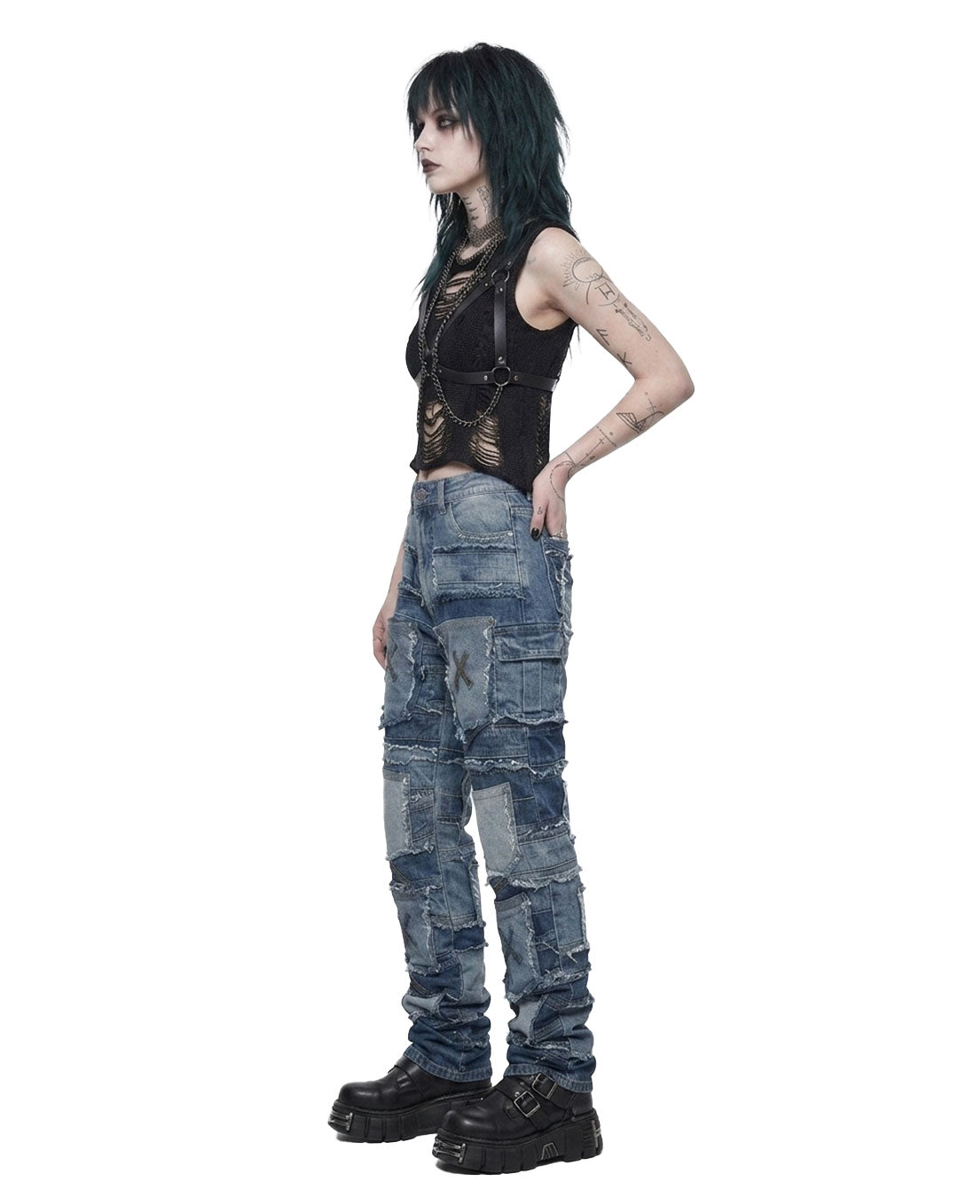  Side profile of baggy patchwork jeans with frayed denim patches and X-stitched pockets, emo pants streetwear look