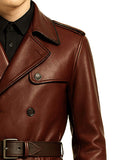 Close-up of maroon gothic leather trench coat with double-breasted front and belted waist