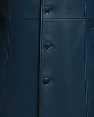 Close-up of Men’s Blue Gothic Leather Coat showing smooth blue leather, stitching, and buttons with no visible embroidery details.