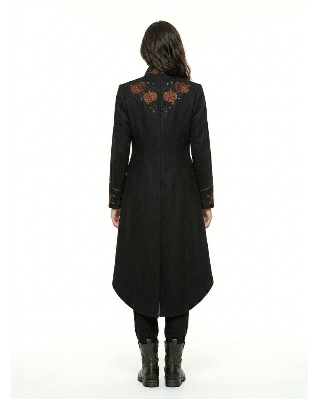 Back view of women’s black steampunk coat with pumpkin embroidery and long tailcoat hem
