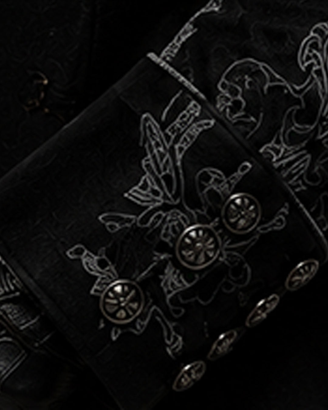 Men’s Halloween costume with black gothic trench coat, raven embroidery, high collar and vampire styling