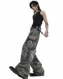 Baggy cargo jeans for men in washed grey denim with wide-leg fit, oversized side cargo pockets, and streetwear styling shown in front and back view.