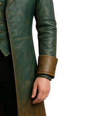 Vintage green brown leather trench coat close-up showing dual-tone leather and antique bronze button details