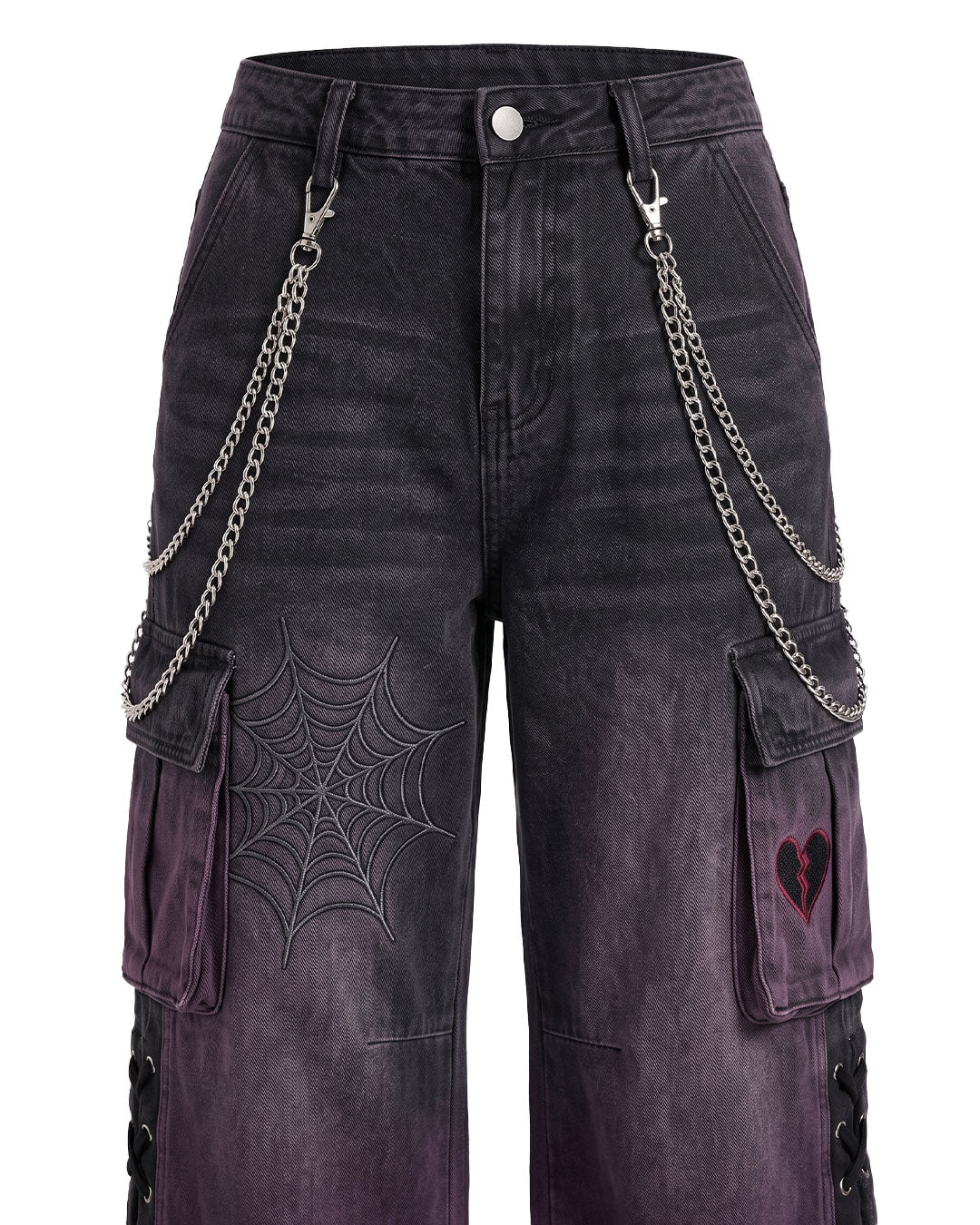 Close-up of chain detail and spiderweb embroidered pocket on cargo pants