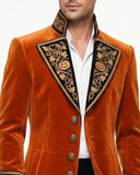 Mens orange coat with black and gold embroidered lapel, cuffs, and long Victorian gothic tailcoat design shown on male model