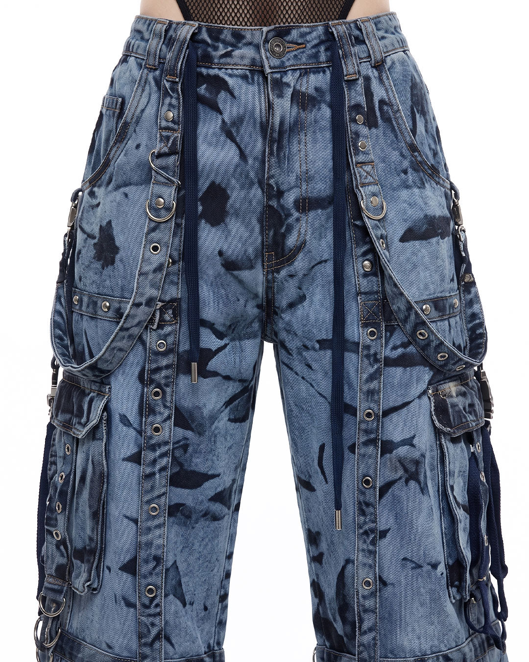 Closeup of wide leg cargo jeans pockets, baggy cargo pants women hardware detail, denim straps and D-rings