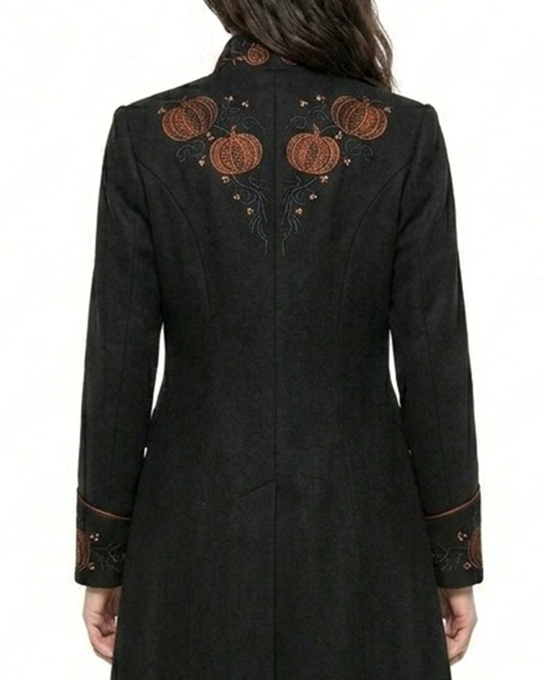 Back view of women’s black steampunk coat with pumpkin embroidery and long tailcoat hem