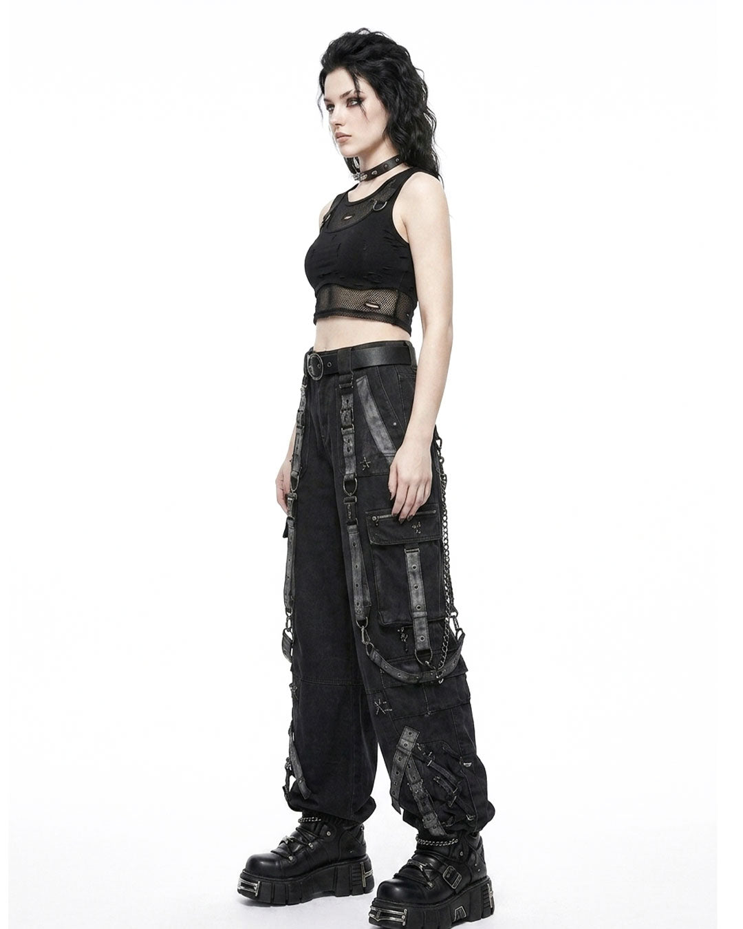 Side view of buckle pants showing wide-leg fit and strap panels