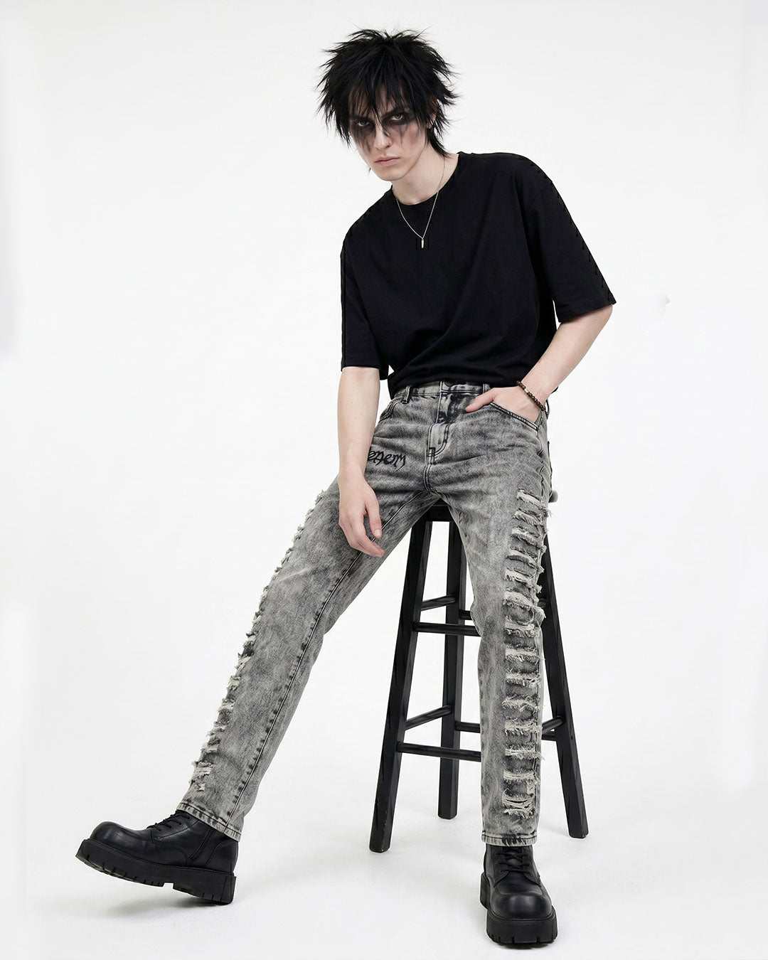 Grey ripped skinny jeans for men with slim biker fit, side view