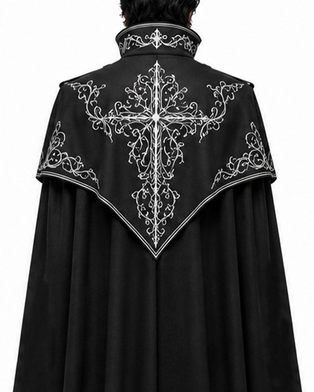 Back view of a black vampire cloak with silver embroidered shoulder cape, cross-inspired ornament and flowing floor-length silhouette.