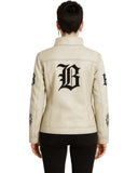Back view of Gothic Cream Leather Jacket with black gothic embroidery on sleeves and back, worn with black pants