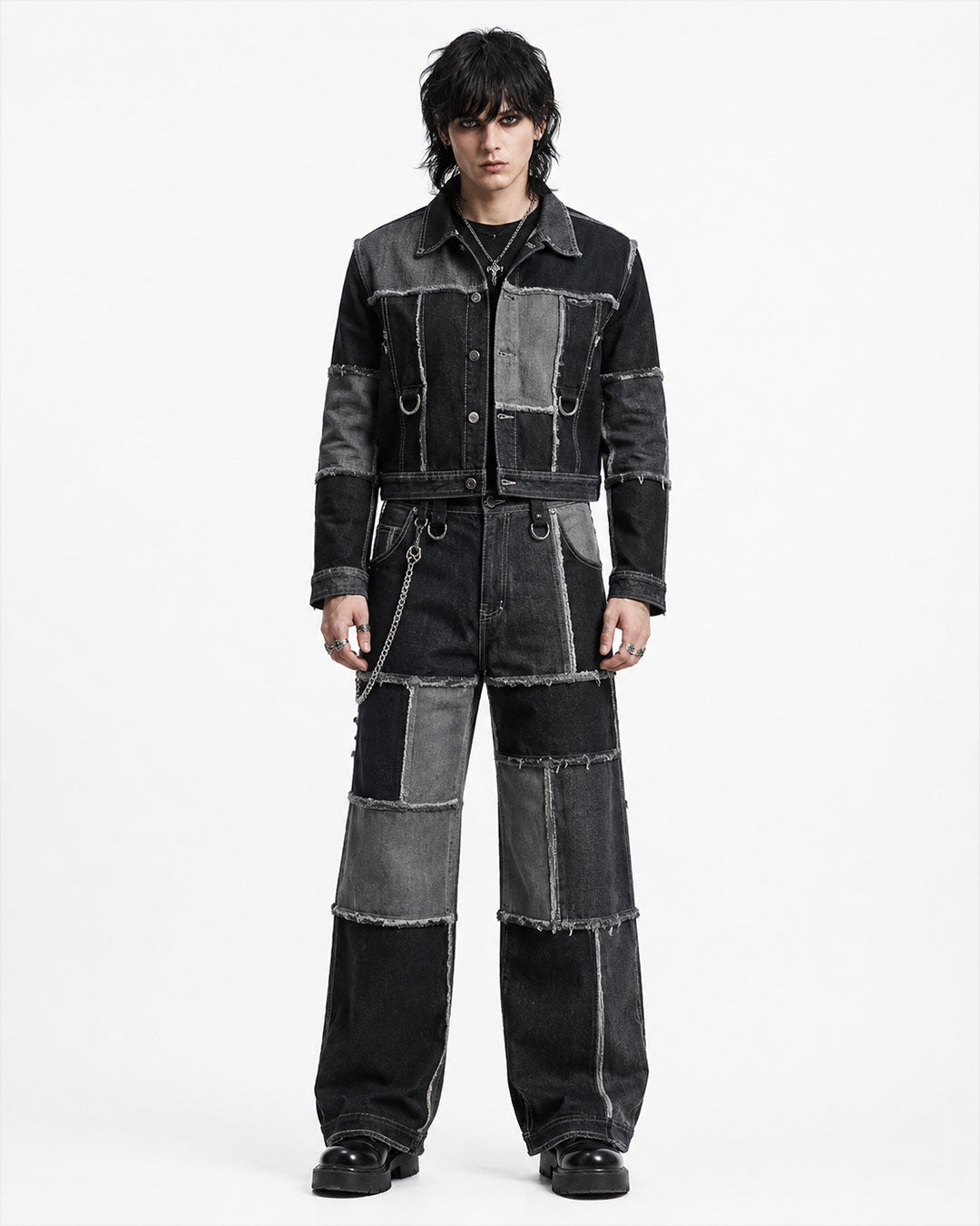 Men’s double denim outfit set with black and grey patchwork jacket and baggy wide-leg jeans front view