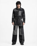 Men’s double denim outfit set with black and grey patchwork jacket and baggy wide-leg jeans front view