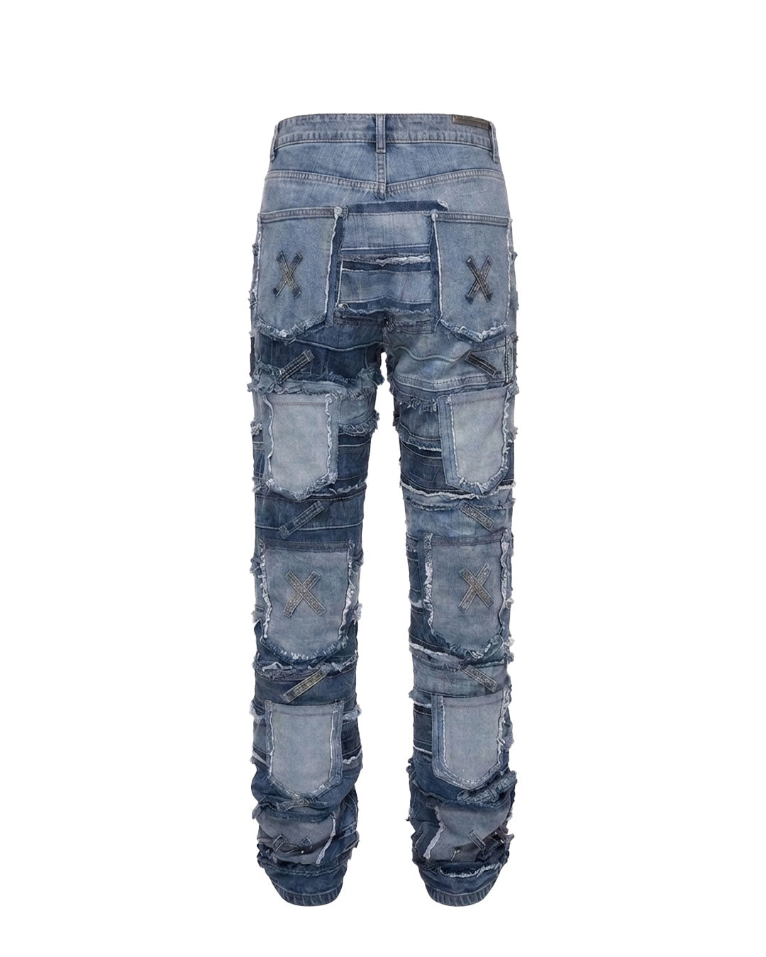 Flat lay back view of baggy patchwork jeans showing X-stitch pocket details and multi-tone denim patchwork