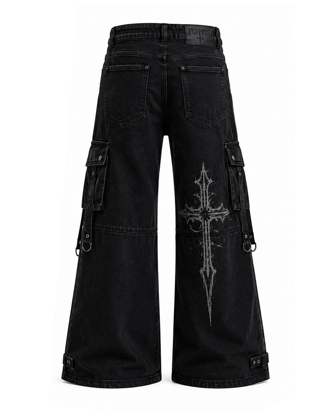 Flat lay of cargo wide leg pants showing back pockets and cross graphic