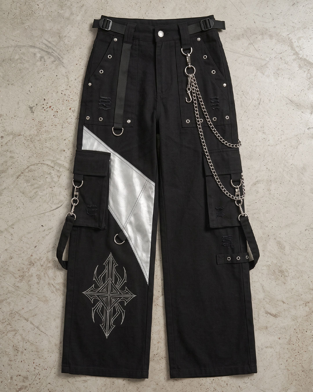 Front view of black cargo pants women showcasing black wide leg pants with utility pockets, detachable chain, embroidered graphic, and premium construction.