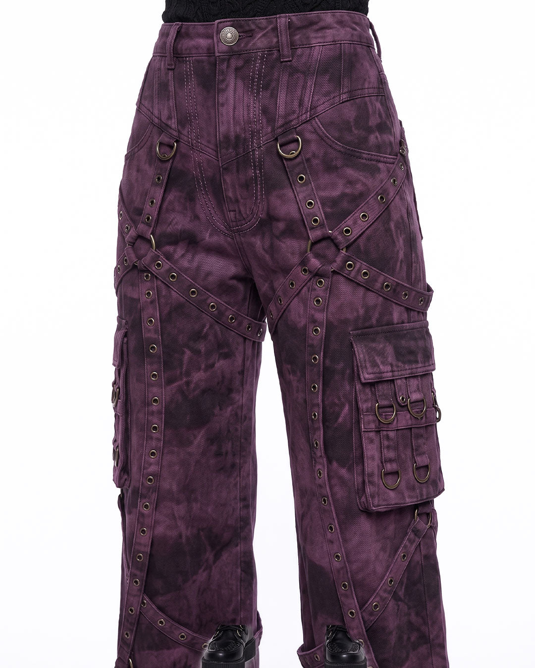 Closeup of purple cargo pants harness straps, emo cargo pants grommet and pocket detail